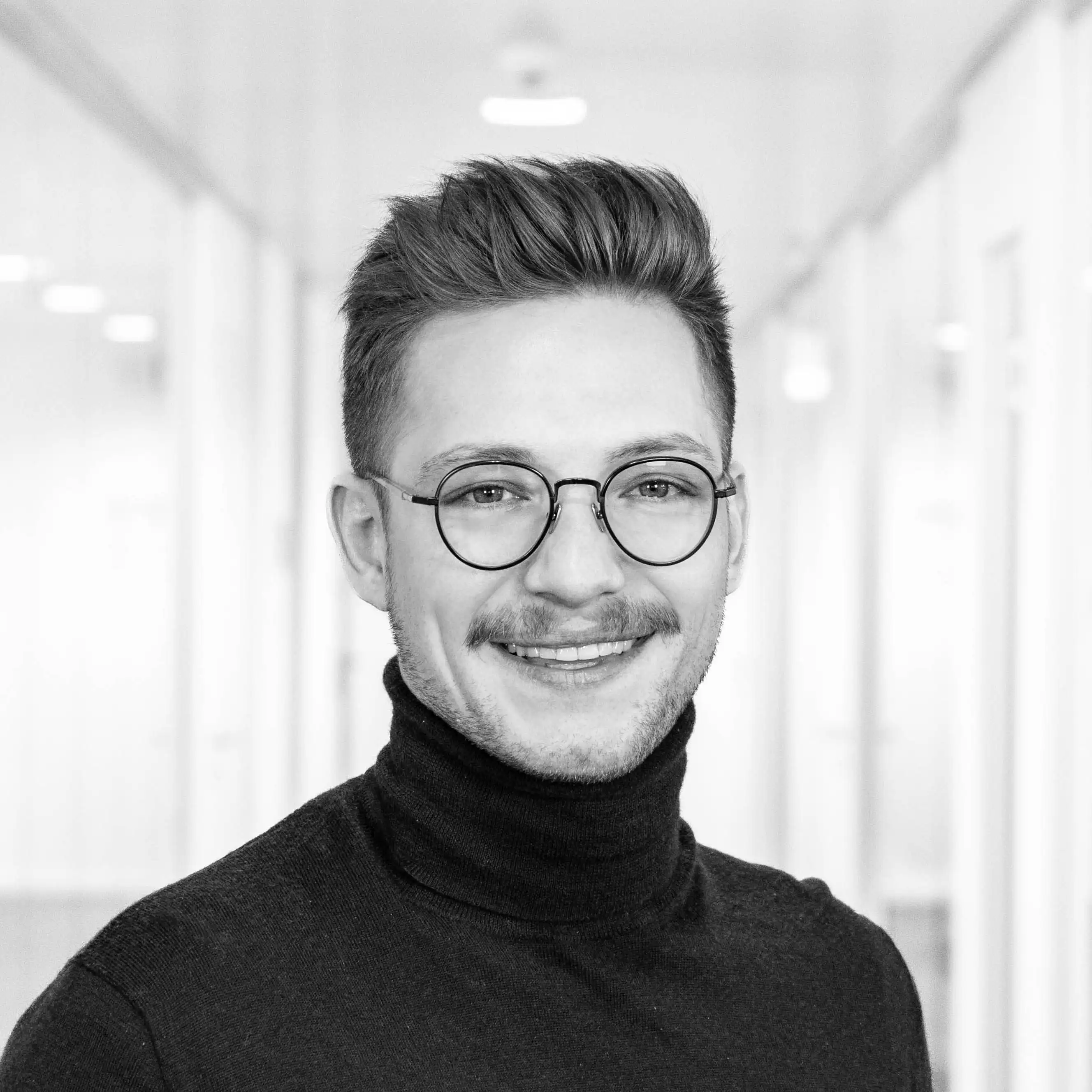 Photo portrait de Tim Dietrich, membre du support chez Relution