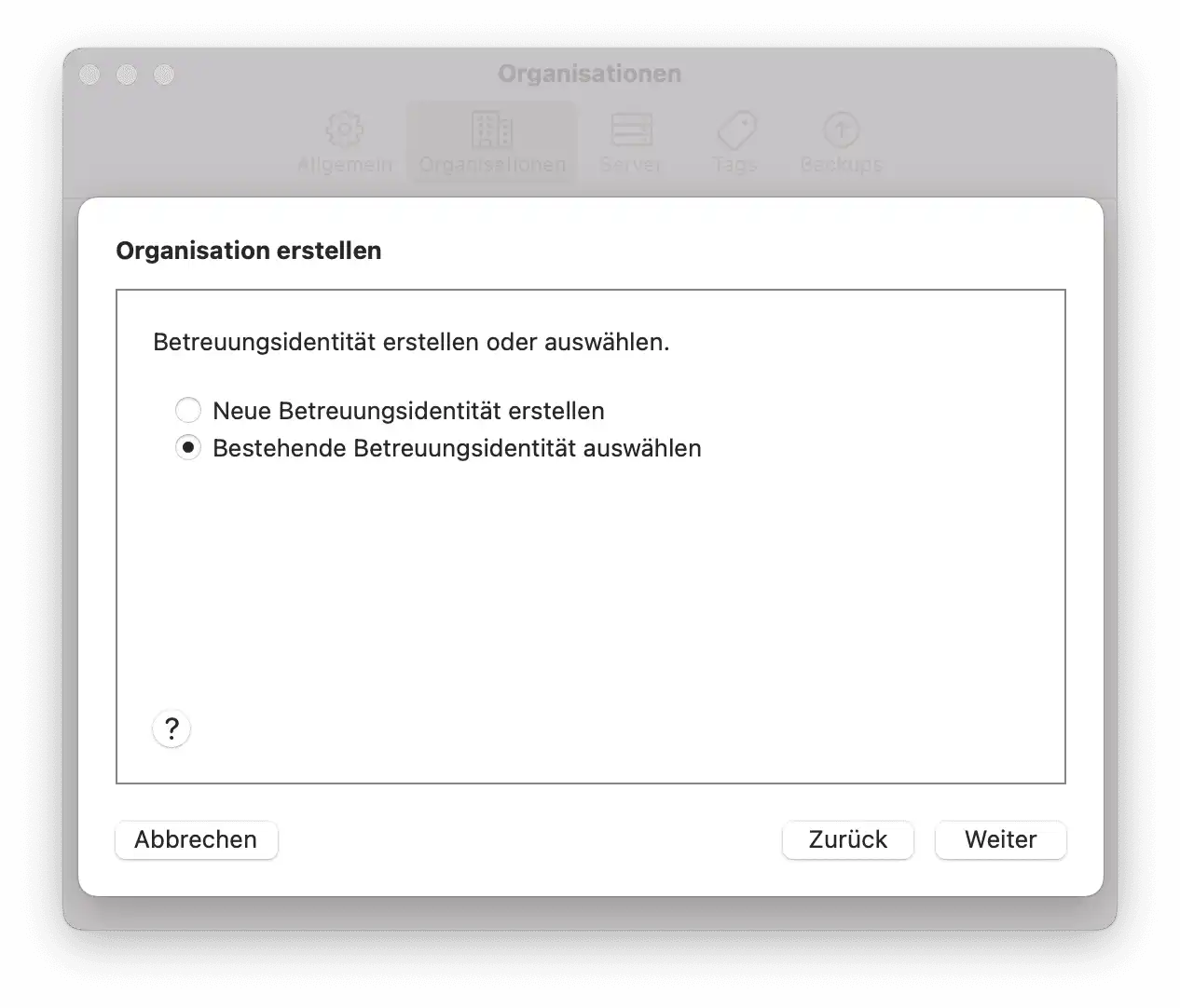 Auswahl einer bestehenden Betreuungsidentität im Apple Configurator zur weiteren Einrichtung